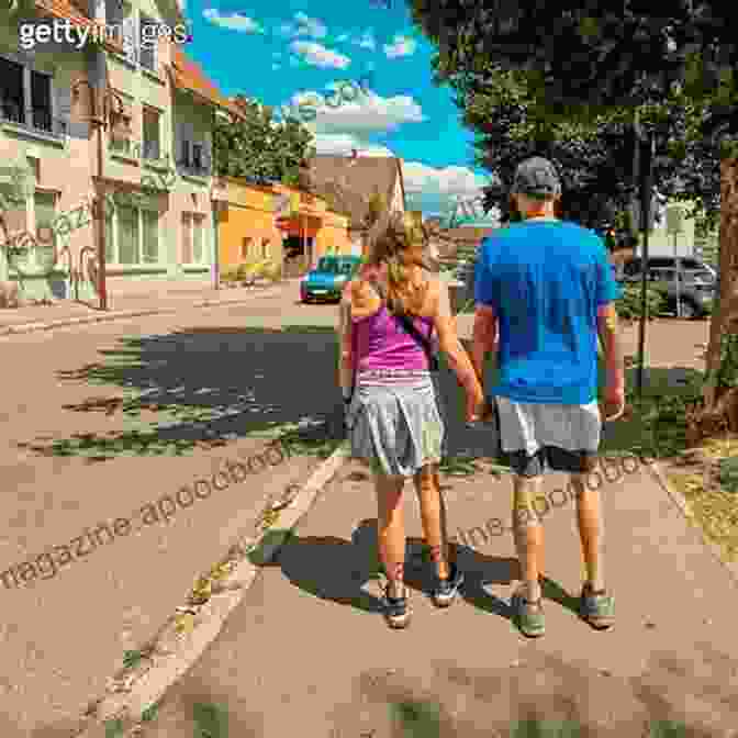 A Couple Strolling Through The Quaint Streets Of A Charming Village On The Gower Peninsula Walking On Gower: 30 Walks Exploring The AONB Peninsula In South Wales (Cicerone Walking Guides)