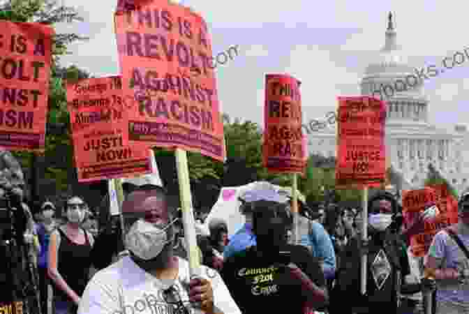 A Group Of Protesters Holding Signs That Read Injustice: Exposing The Racial Agenda Of The Obama Justice Department