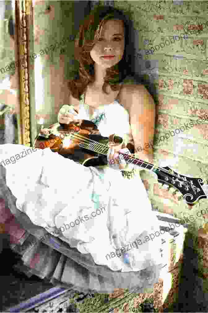 A Mandolin Player Sitting On A Porch, Playing The Bluegrass Song Ooba Mandolin Essentials: Bluegrass Volume One: 10 Essential Bluegrass Songs To Learn On The Mandolin