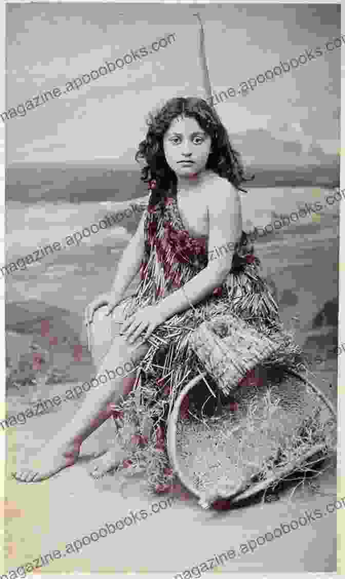 A Young Maori Woman Sits On A Rock Overlooking The Ocean, With Her Back To The Camera. The Sun Is Setting In The Distance, And The Sky Is A Beautiful Mix Of Orange And Purple. The Woman Is Wearing A Traditional Maori Cloak, And Her Hair Is Long And Black. She Looks Strong And Confident, And Her Expression Is One Of Determination. Legacy Whiti Hereaka