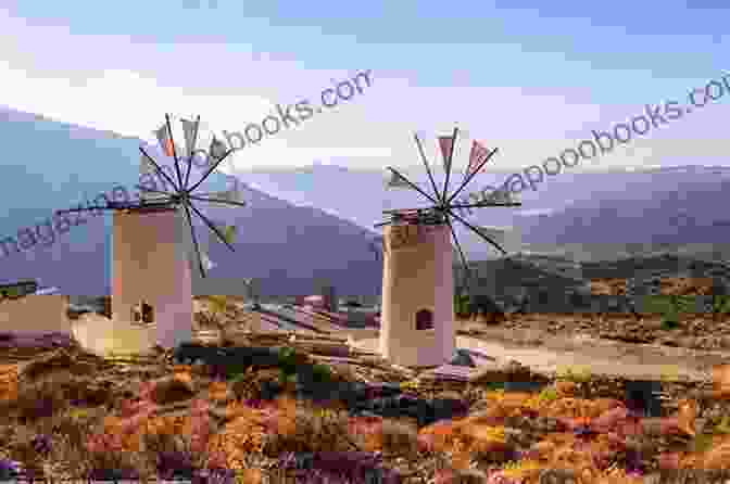 Cretan Landscape With Traditional Windmills, Mountains, And Sea Images Of Crete Loose Ends