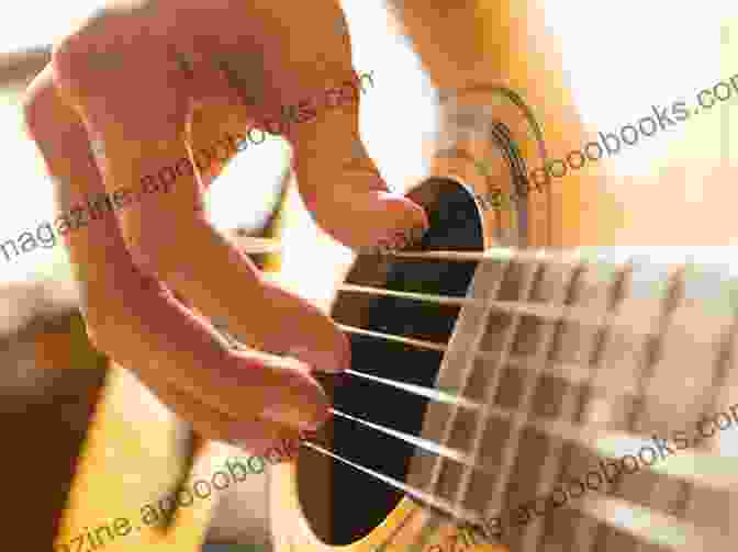 Image Of A Guitarist Demonstrating Intricate Fingerpicking Techniques Mastering Guitar Concepts S E Kloos