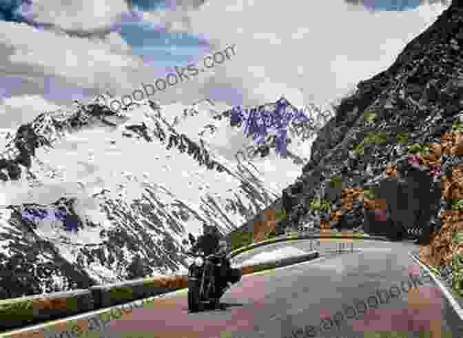 Motorcyclist Riding Through A Mountain Pass In Europe, Surrounded By Stunning Mountain Scenery Roads Are For Journeys : Motorcycling Through Europe